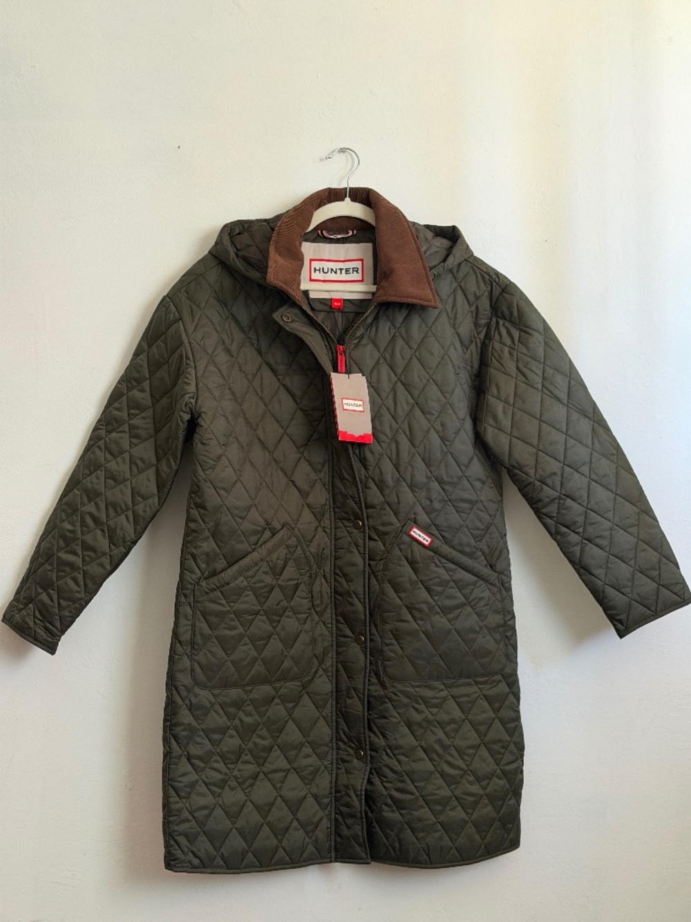 Hunter - Long, green puffer coat